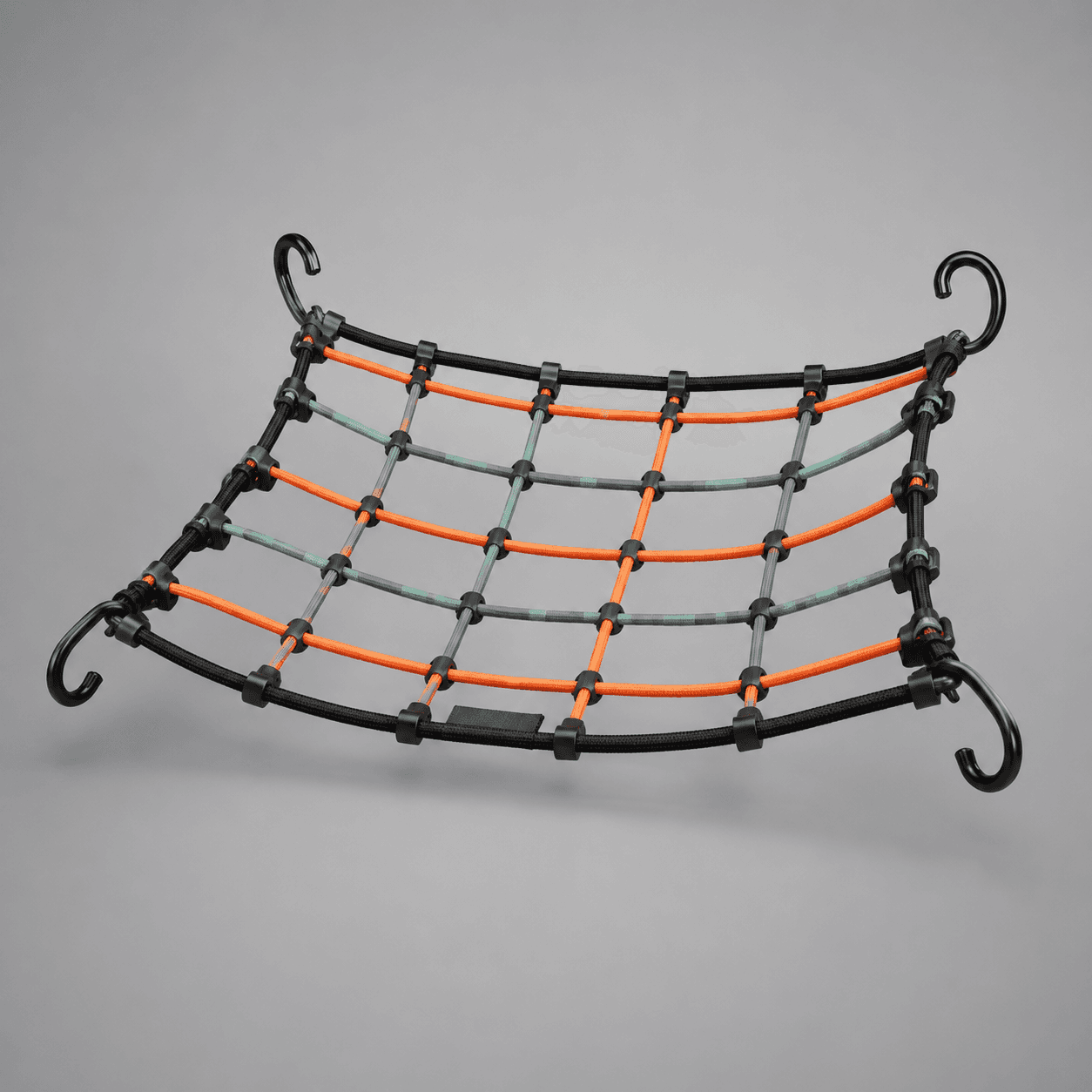 Cargo Net Organizer — A stretchy net that pins loose loads to a rear rack.