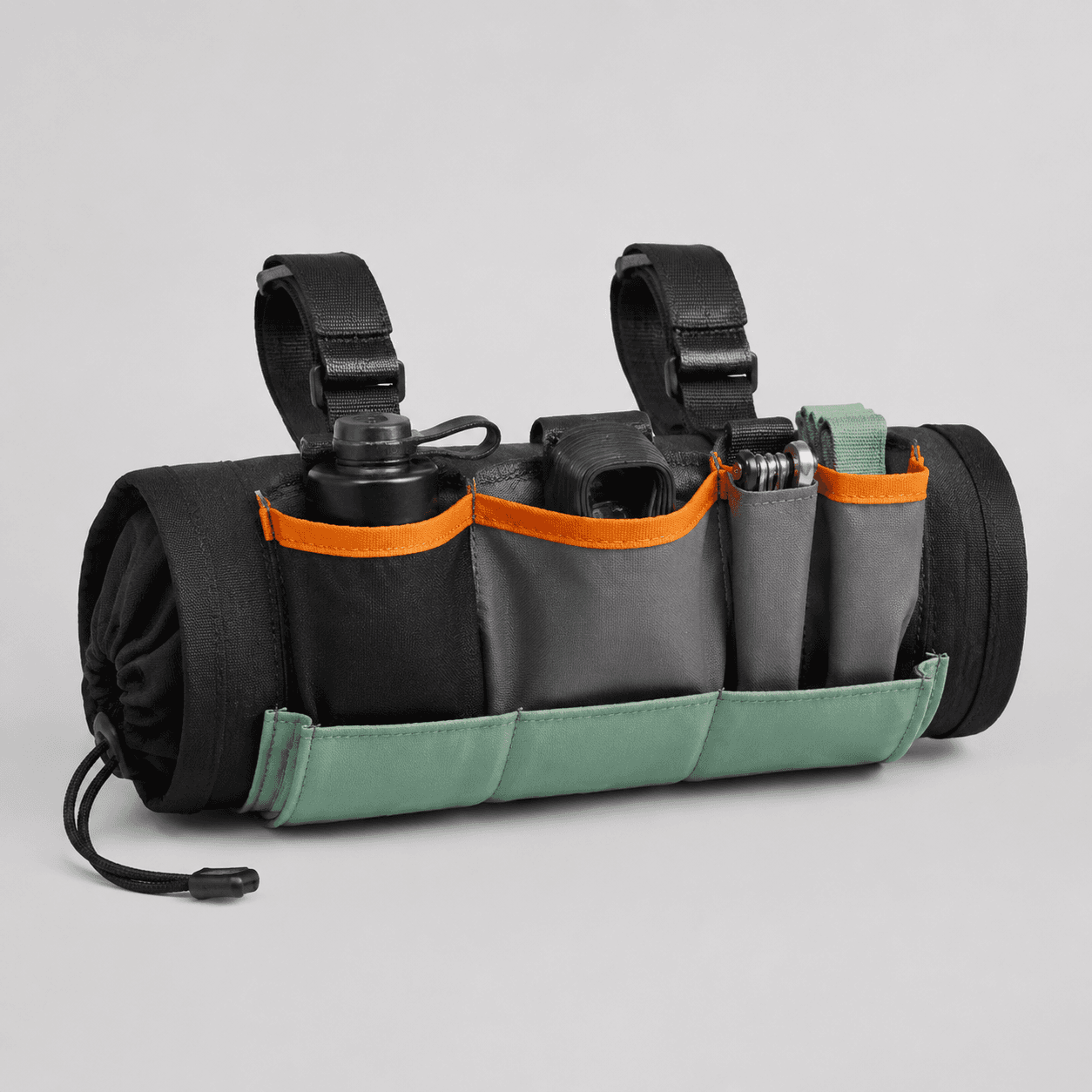 Handlebar Utility Roll — A roll-up organizer that ties onto the bars for tools and odds and ends.